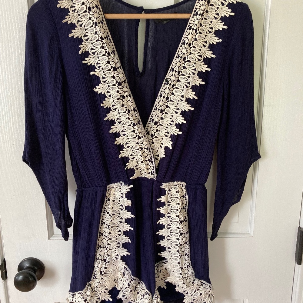 Navy romper with lace detail
